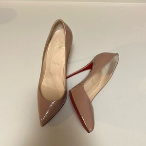 Nude Christian Louboutin heels. Size 39 1/2. Excellent condition.